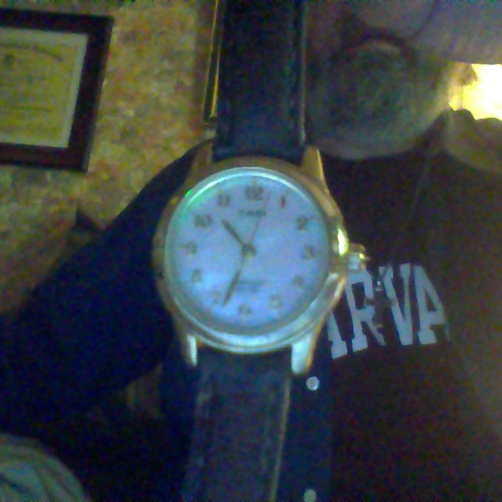 ladies leather band Timex watch with mother of pearl face